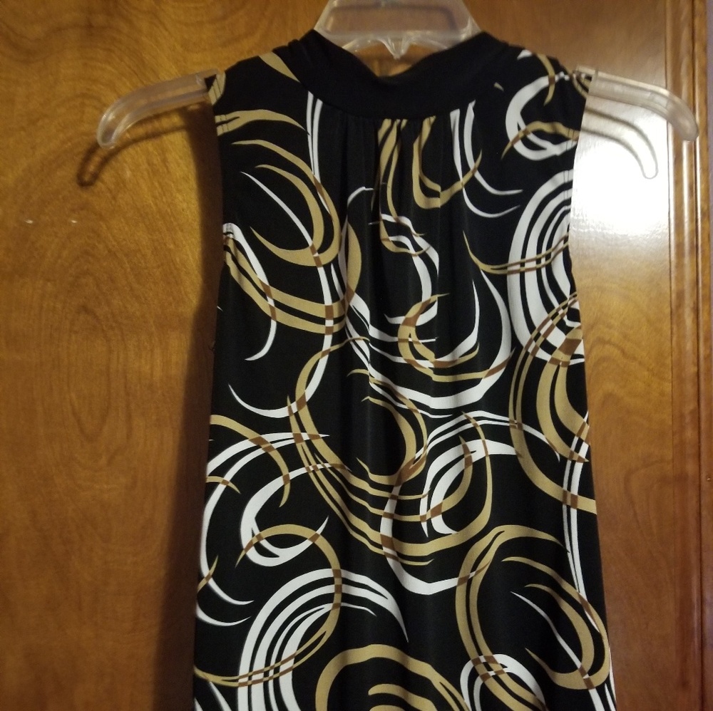 Tempted sleeveless blouse with tie in back